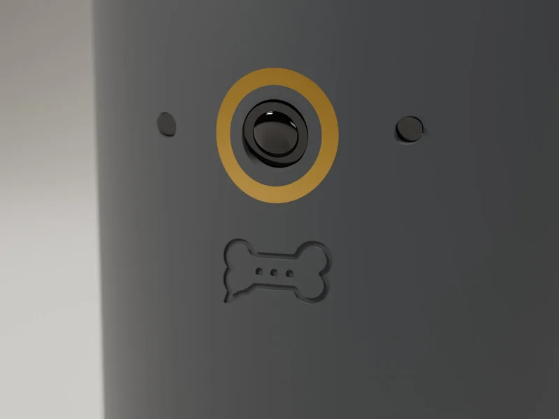 Close-up render of the Plus camera on a graphite shell: a black lens inside a gold ring, with the bone mark below.