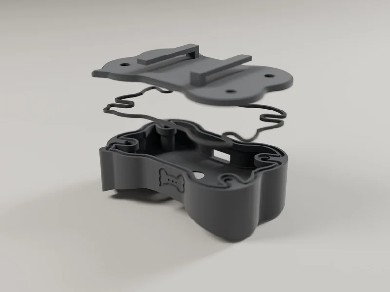 Exploded render of the Bark Tag: the lid with its collar hooks, a bone-shaped gasket, and the body below.